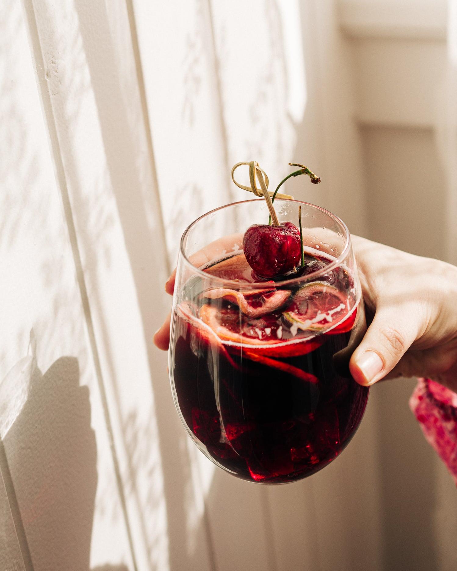  A colorful twist: the cherries add a pop of color to this vibrant drink.