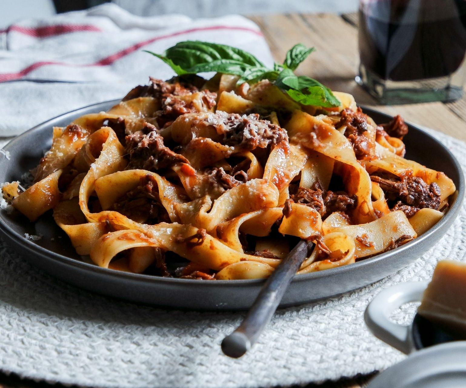  A comforting bowl of pappardelle with a rich meat ragù.