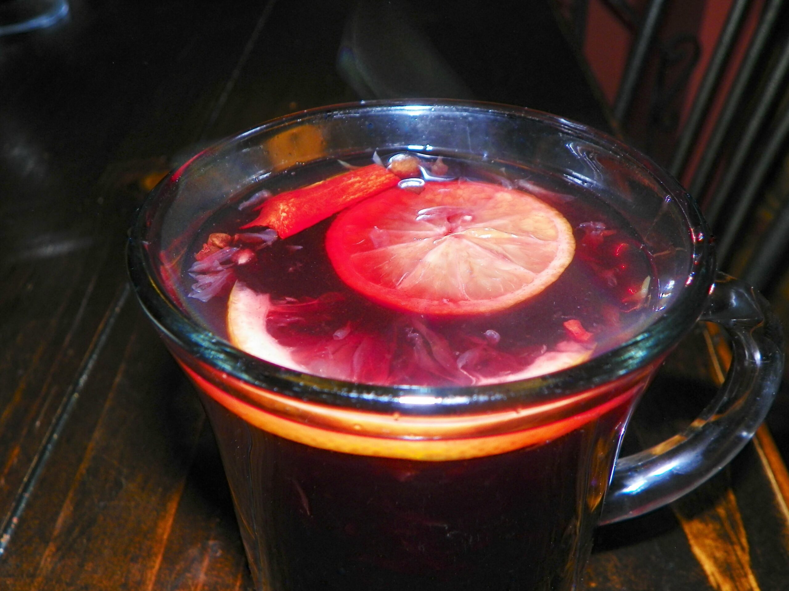  A cozy blend of red wine, spices, and orange slices - the perfect winter warmer.