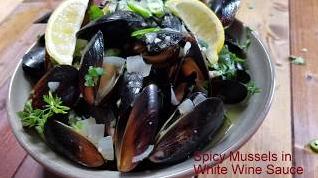  A dish full of flavor and texture, these spiced mussels in white wine is a crowd pleaser.