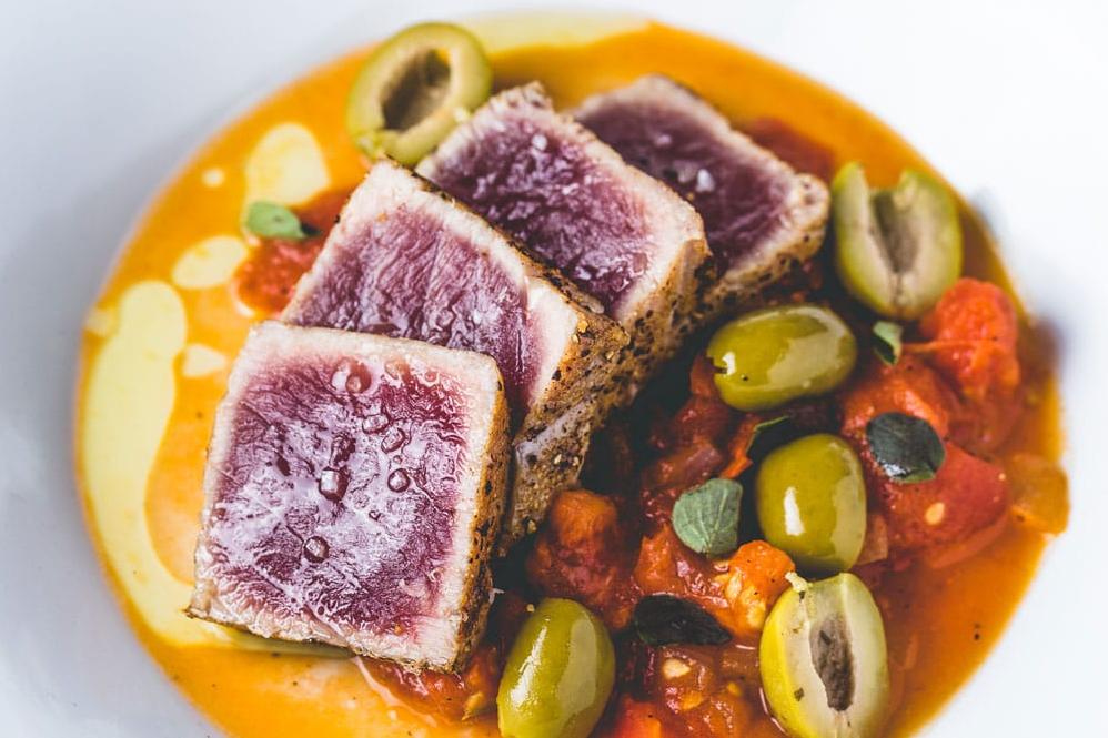  A feast for both the eyes and taste buds, this beautifully presented pan-seared tuna will impress even the most discerning foodie.