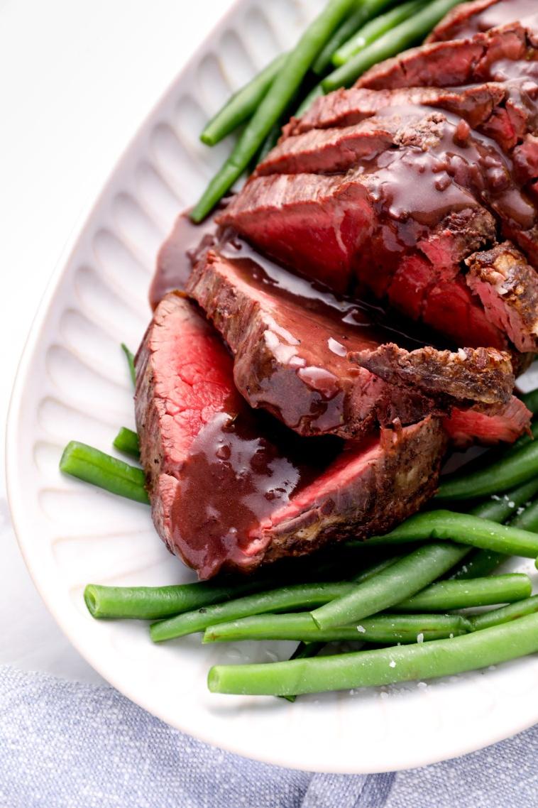  A fork tender piece of roast beef tenderloin, paired with rich and silky wine sauce, is a symphony of flavors in your