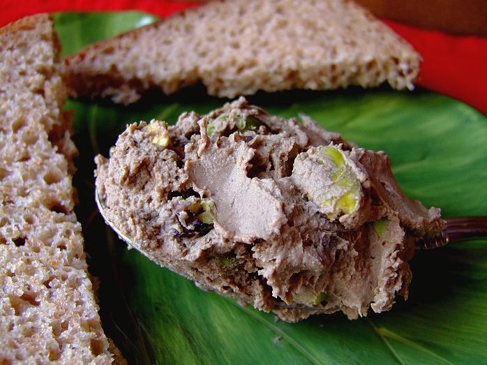  A savory chicken liver paté with a touch of luxury and elegance.
