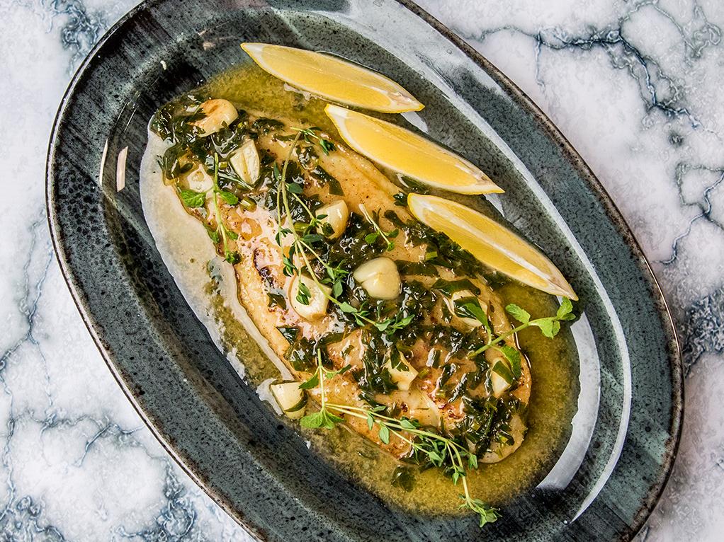  A succulent and flaky white bass complemented by a velvety wine butter sauce