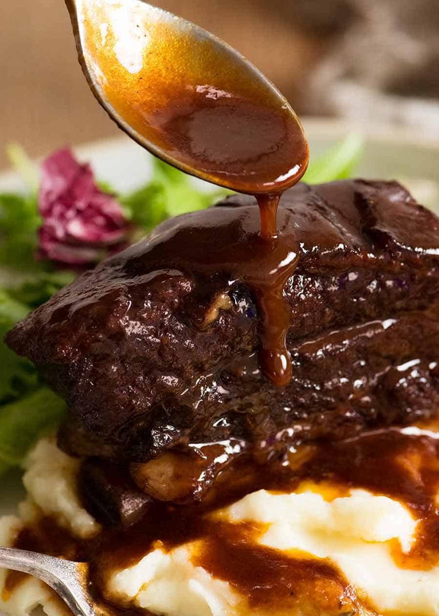  A succulent slab of beef ribs lathered in a Cabernet sauce awaits your taste buds.