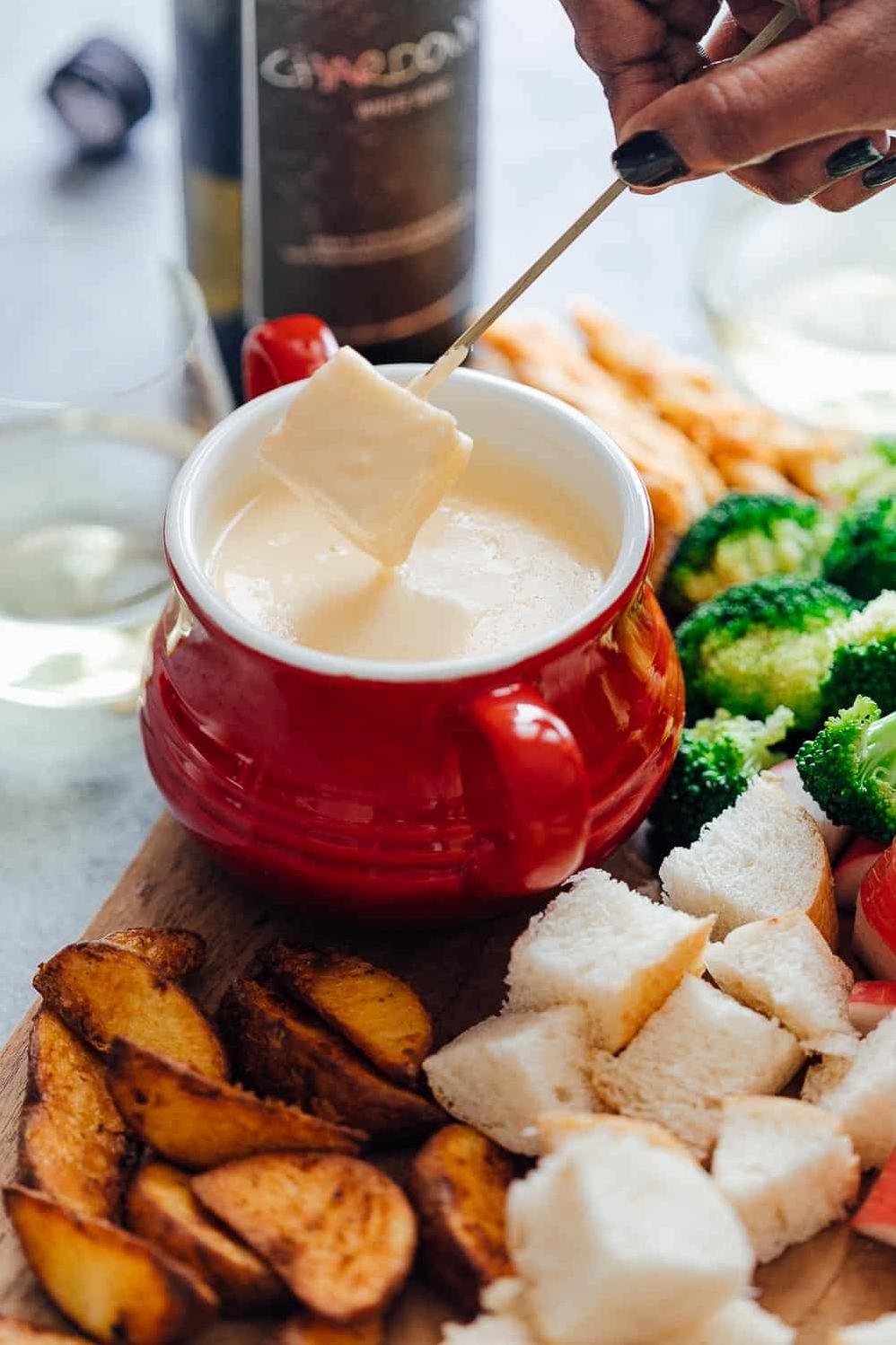  Add a splash of wine to the bubbling pot of cheese to take your fondue to the next level of flavor and complexity.