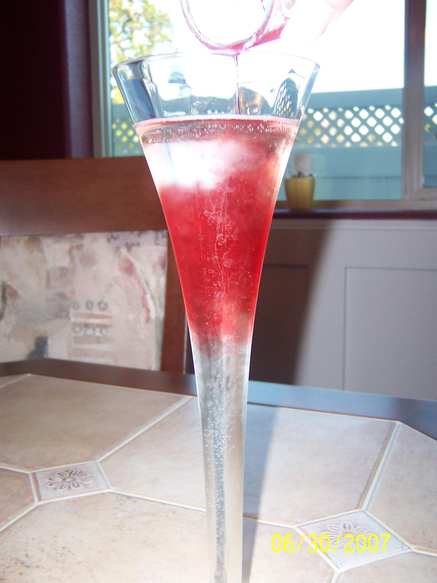  Add some glam and fizz to your evening with this Cassis Champagne Cocktail.