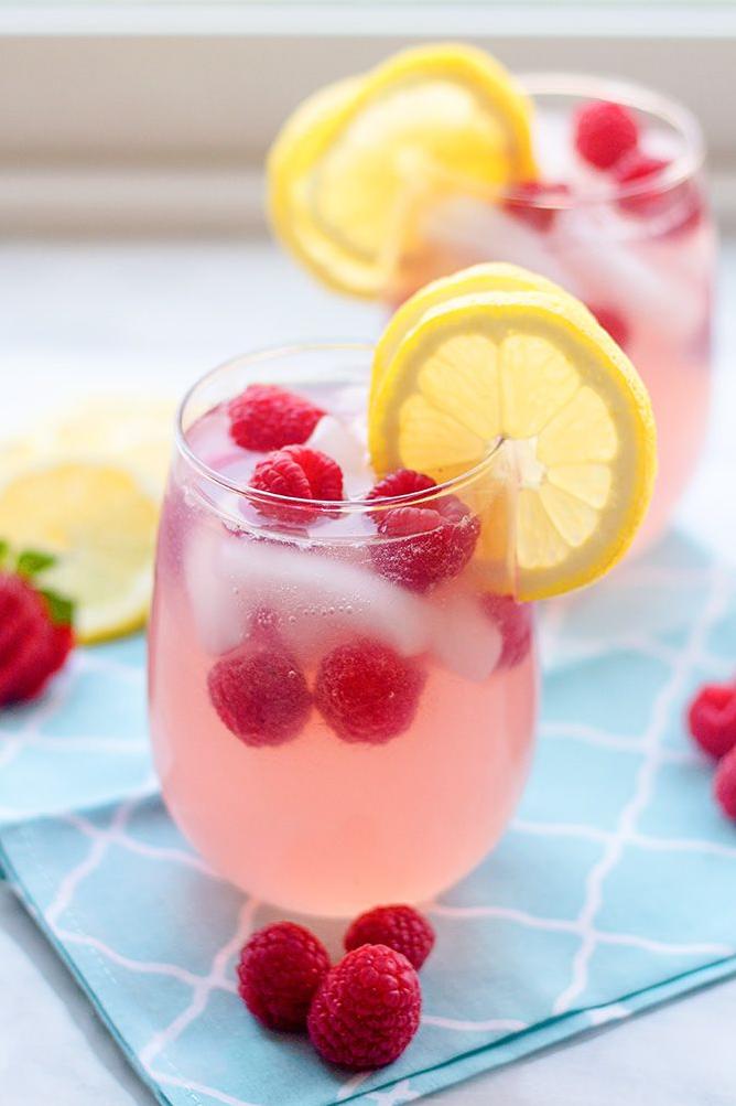  Adding juicy raspberries brings a pop of color and flavor to your drink.