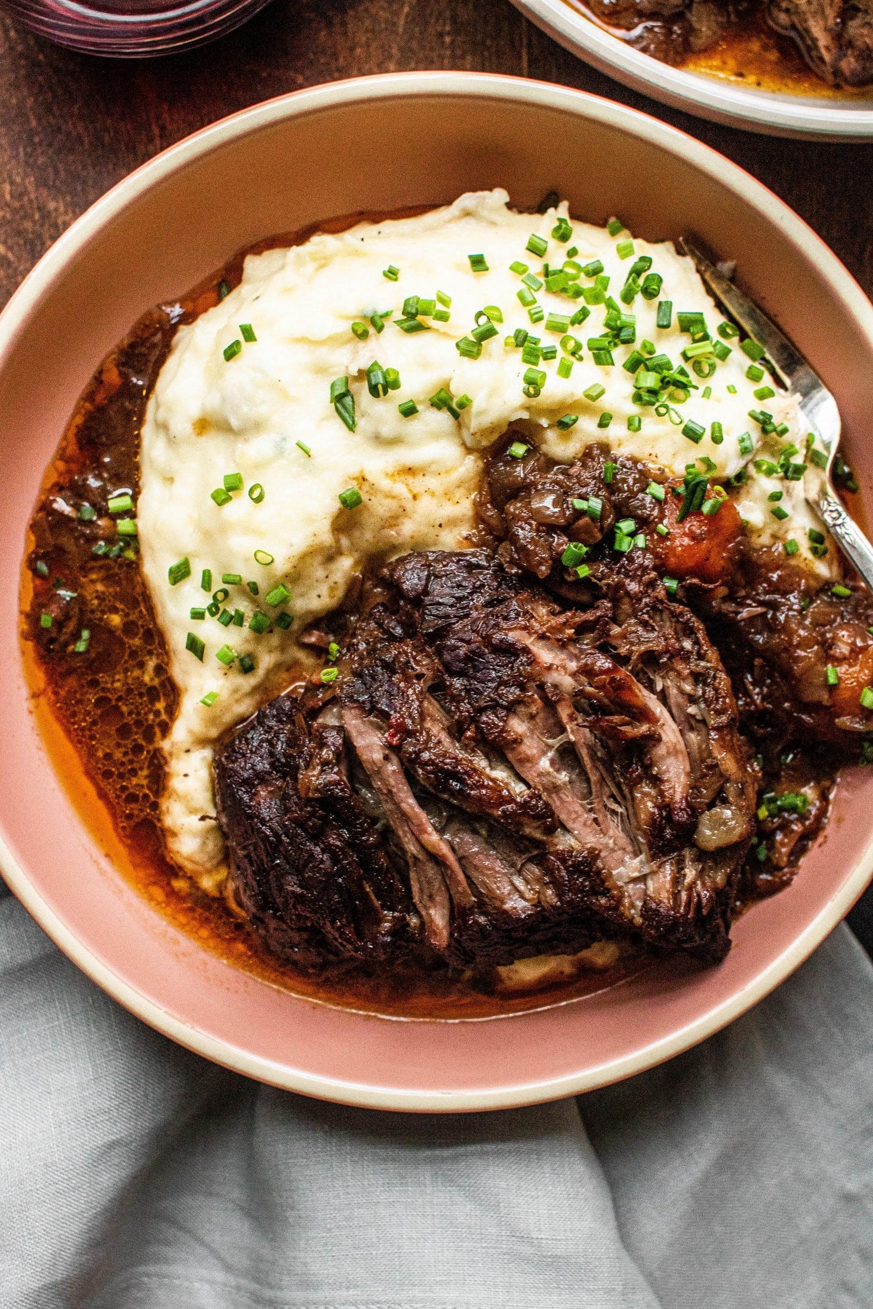  Aromatic red wine blends perfectly with this slow-cooked beef dish