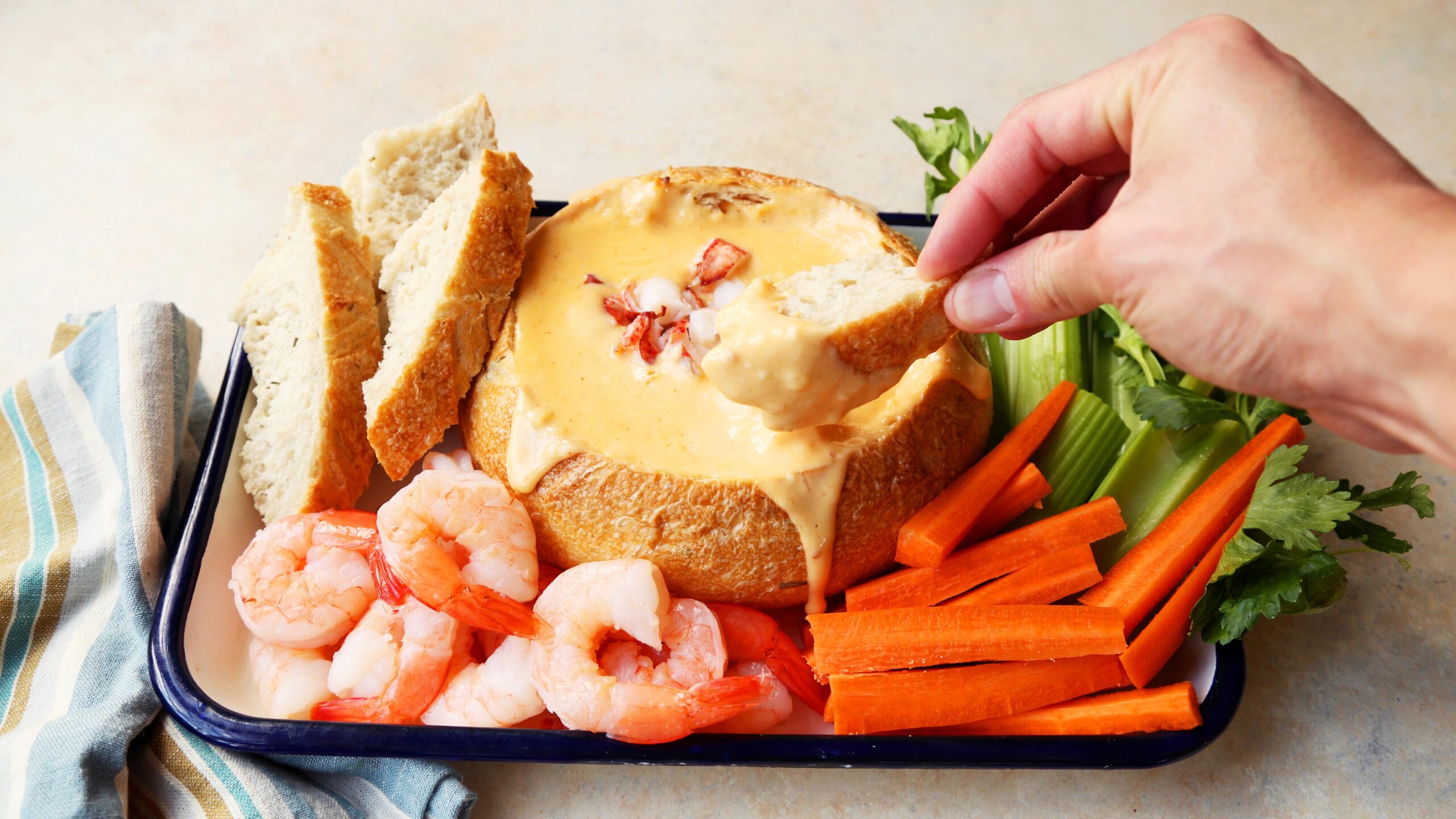  Be prepared to fall in love with the buttery, melt-in-your-mouth lobster meat that pairs exceptionally well with the tangy dipping sauce.