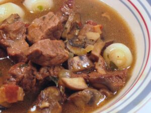 Beef Stewed in Red Wine With Pearl Onions and Mushrooms