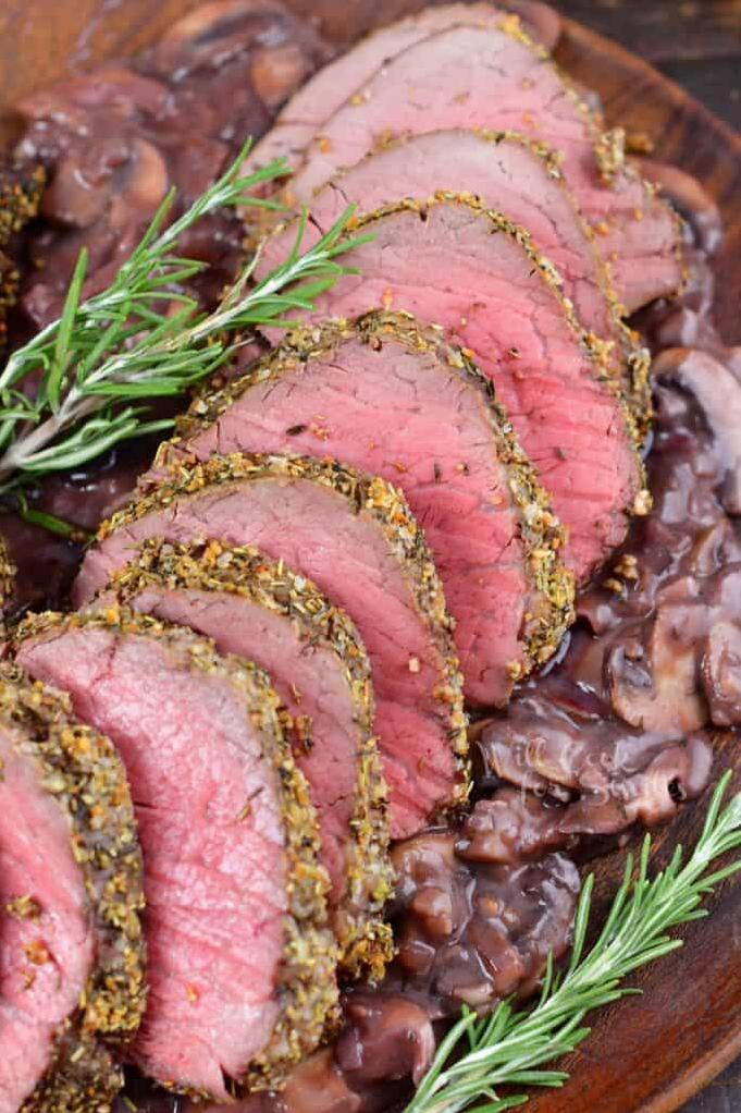  Beef up your dinner game with this delectable roasted tenderloin bathed in a decadent rosemary and chocolate sauce.