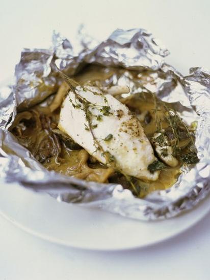  Chicken breast, mushrooms, and white wine get cozy in a bag for the perfect baked dinner.