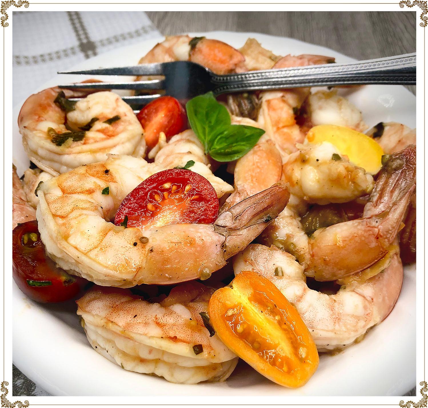  Chopped basil and oozing tomato sauce add color to the succulent shrimp.