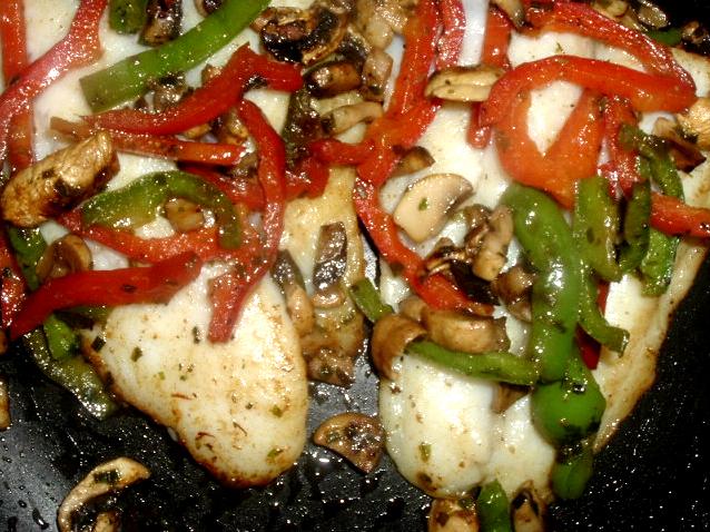  Crispy Baked Tilapia smothered in flavorful herbs and veggies