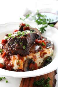 Delicious Braised Short Ribs With Red Wine Gravy and Vegetables
