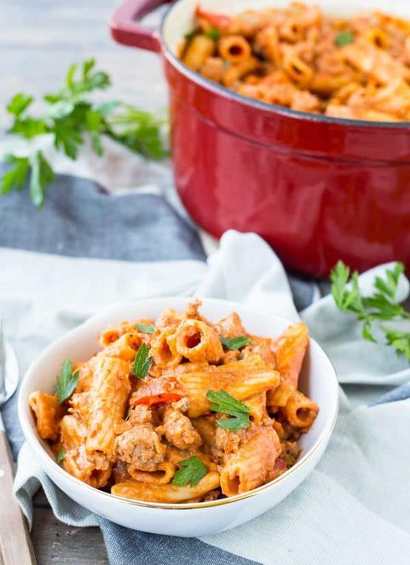  Delight in the vibrant red hues that make this pasta dish a feast for the eyes and the mouth.