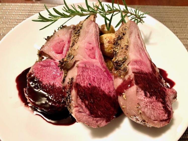  Discover a new favorite recipe with this herb-coated lamb and its sublime port-red wine sauce