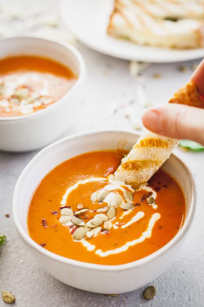  Dive into a bowl of creamy tomato soup with a splash of wine