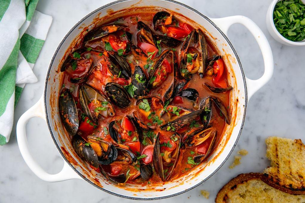  Dive into the irresistible aroma of fresh Mussels in Red Wine Sauce.