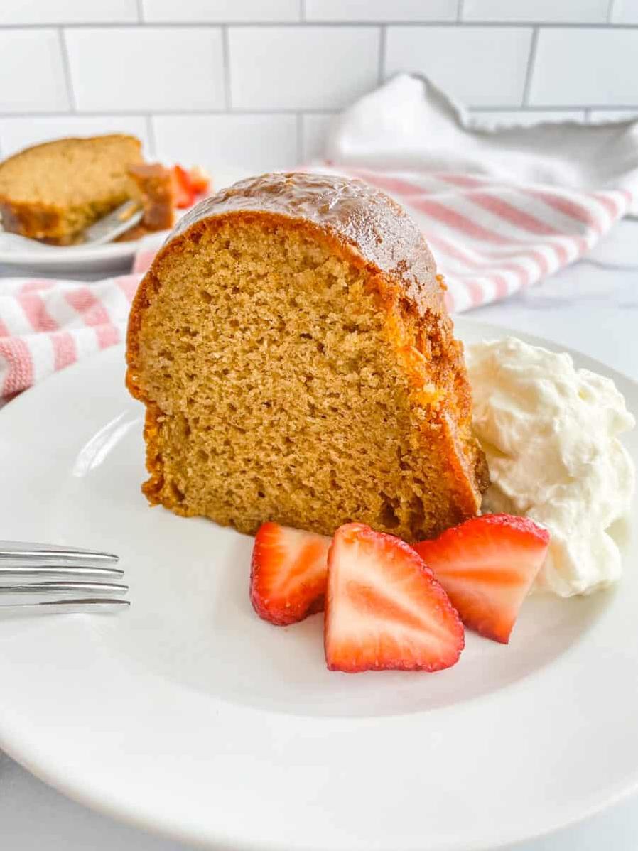  Dive into this deliciously moist cake, soaked in white wine syrup.