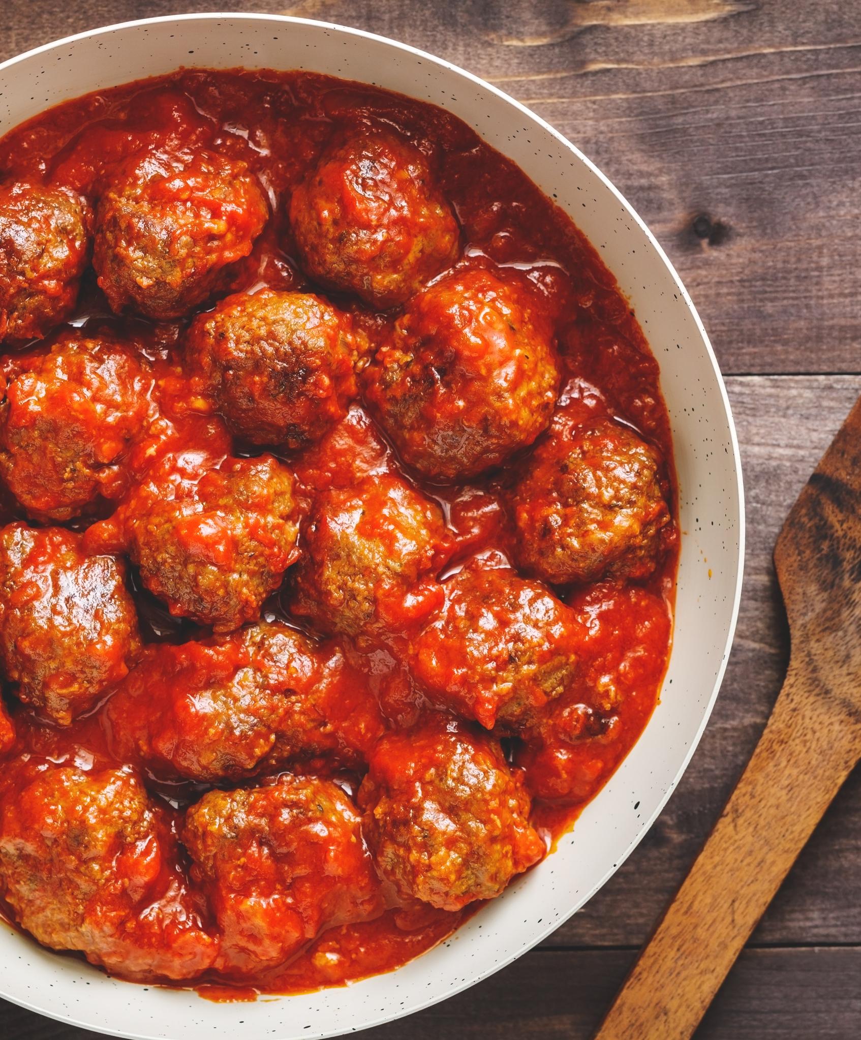  Drizzle the wine sauce over the meatballs to perfection.