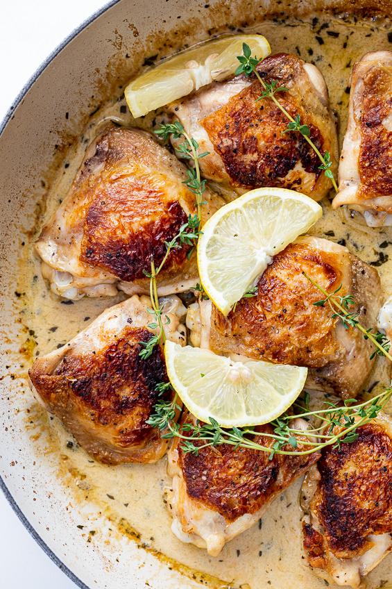  Drizzling the fragrant herb sauce over tender chicken