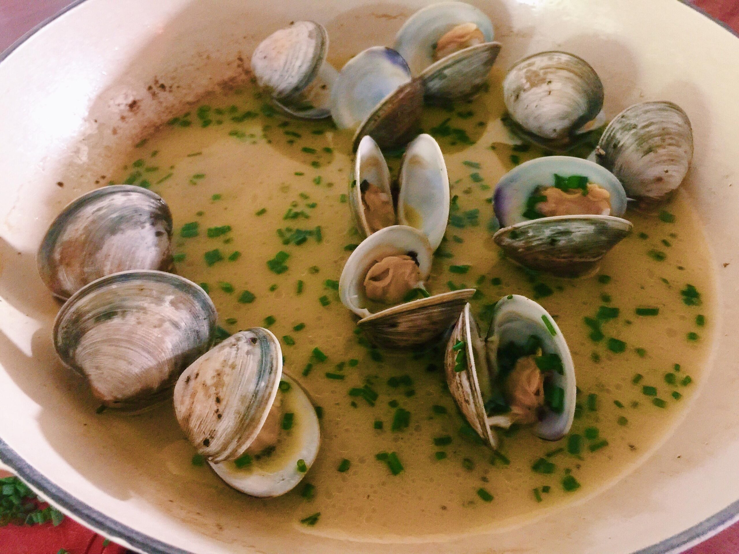  Drown your sorrows in a bowl full of plump clams soaked in a tangy white wine sauce.