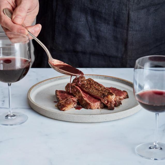  Elevate your steak game with a bold, peppery crust and a decadent wine sauce