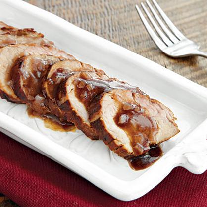  Elevate your weeknight meal with this indulgent pork loin smothered with a delicious wine reduction sauce.