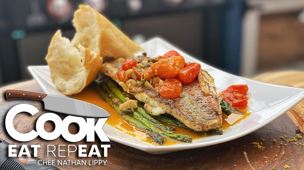  Experience the magic of red snapper and wine sauce with every bite.
