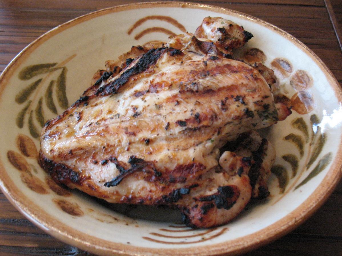  Flavorful Herbs: The chicken is infused with a medley of tantalizing herbs.