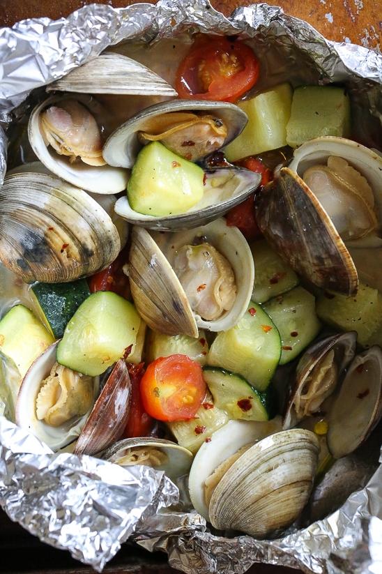  Get ready for a flavor explosion with our grilled little neck clams in wine sauce!