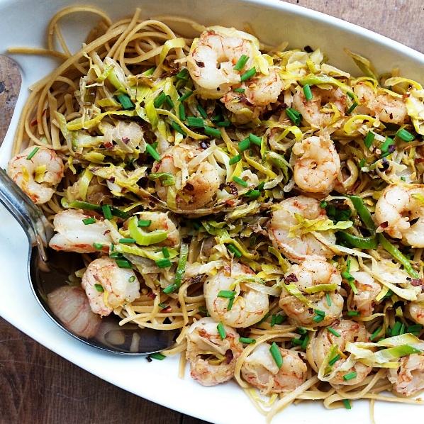  Get your seafood fix with succulent shrimp nestled among al-dente linguine.