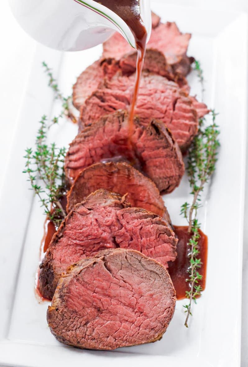  Impress your dinner guests with this elegant and delicious dish of beef tenderloin in wine sauce.