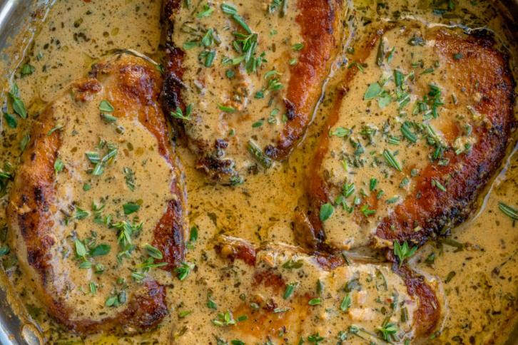  Impress your guests with this easy yet sophisticated wine-braised pork chops.