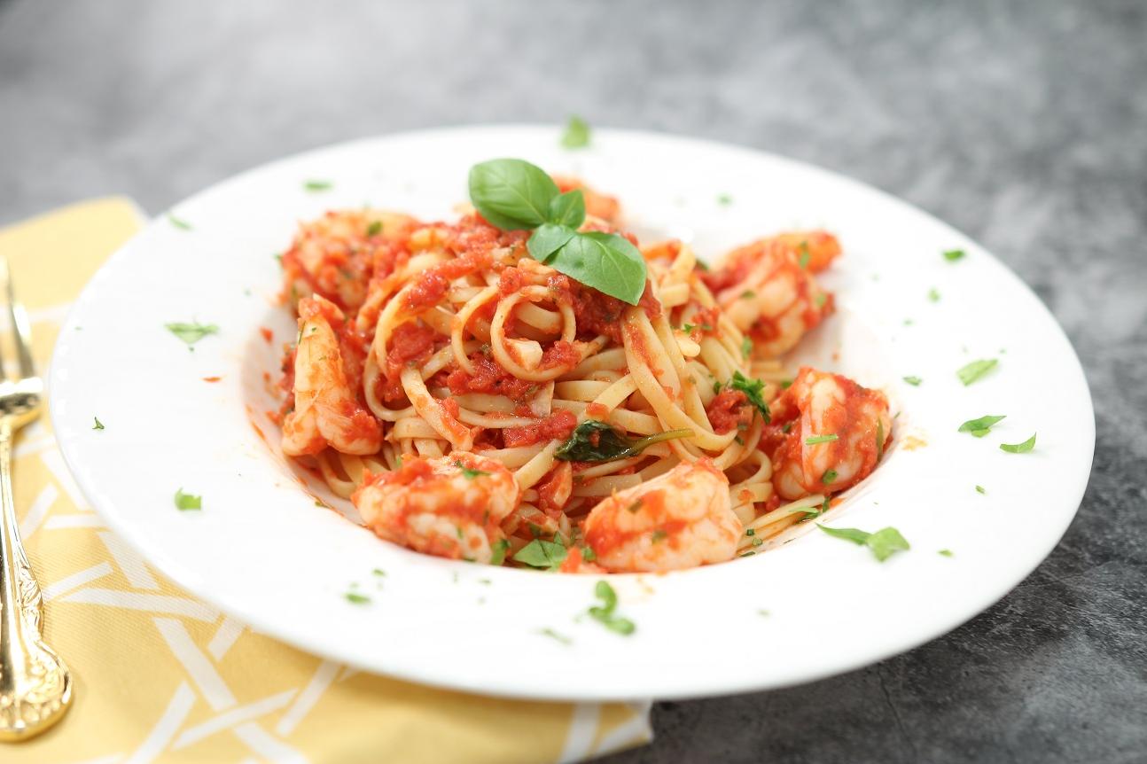  Indulge in a mouthwatering and comforting pasta dinner with a glass of your favorite white wine