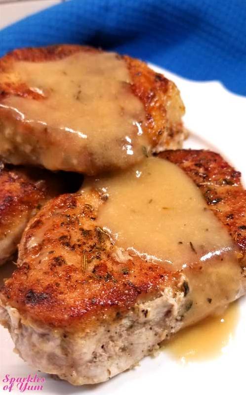  Indulge in tender pork chops smothered in a rich wine sauce
