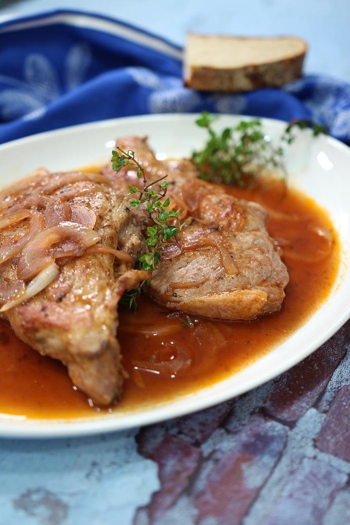  Juicy pork chops swimming in a pool of lip-smacking sauce
