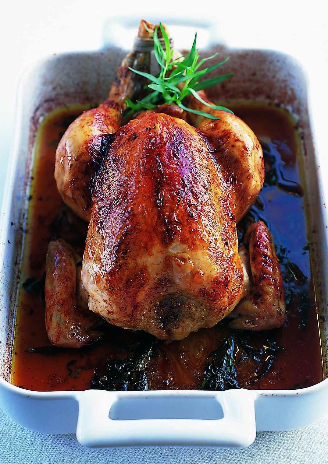  Juicy roast chicken drenched in a tarragon wine gravy so divine, you'll want to savor every bite!