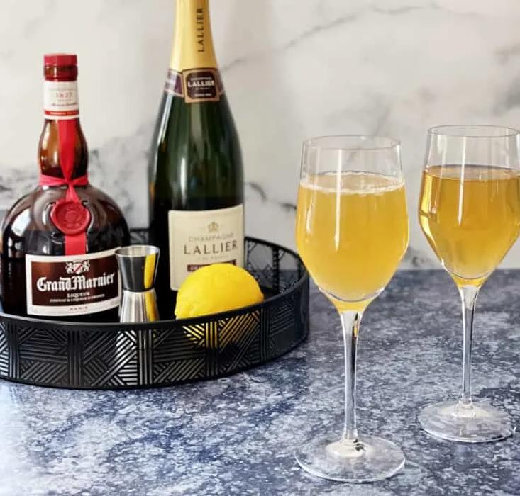 Let the bubbles take you to the sky with this refreshing Grand Champagne Cocktail!