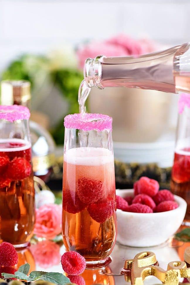  Let the delicate and playful aroma of raspberries tickle your nose as you enjoy this delightful cocktail.