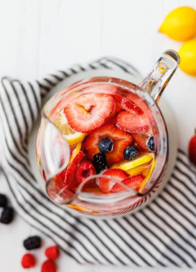  Let the raspberries and wine infuse together for a delicious sangria blend.