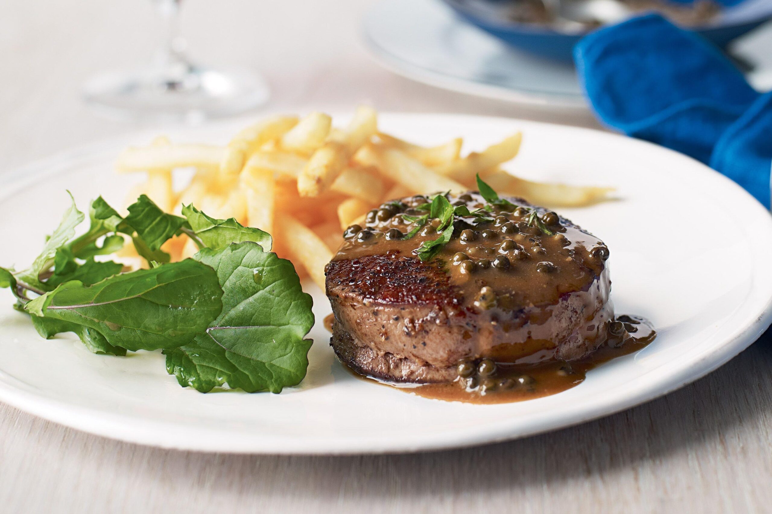  Melt-in-your-mouth steak with a Cabernet and green peppercorn butter is a match made in culinary heaven!
