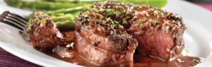 Peppercorn-Seasoned Steaks With Mustard-Wine Sauce