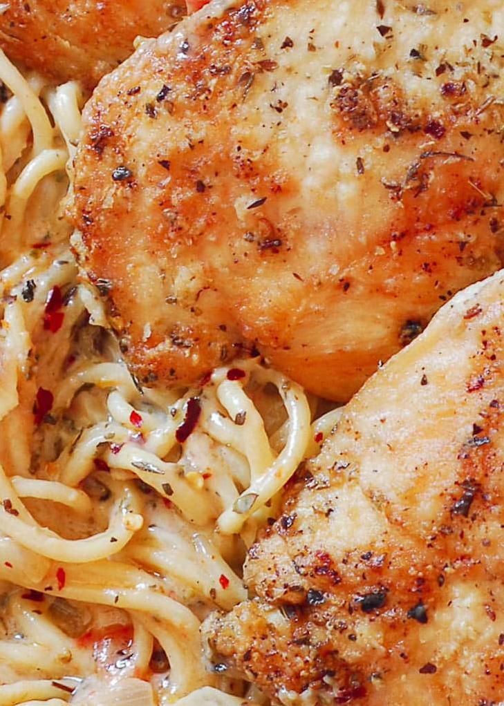  Perfect for dinner parties or family nights in, this chicken with white wine sauce and tagliatelle is sure to impress.
