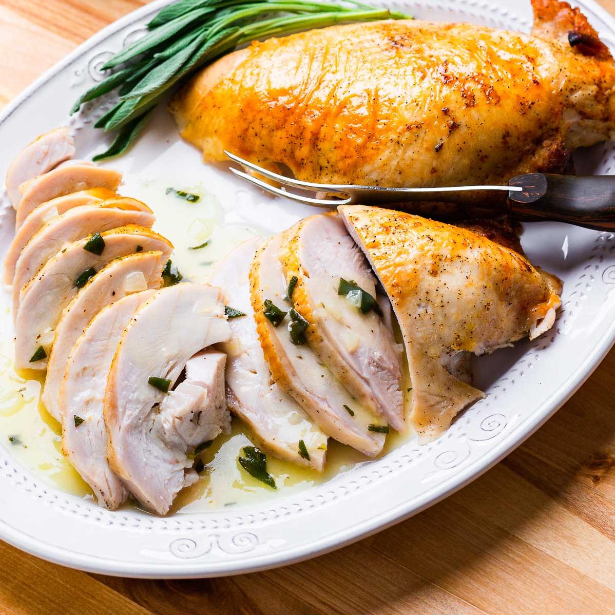  Perfectly roasted turkey bathed in white wine pan sauce.