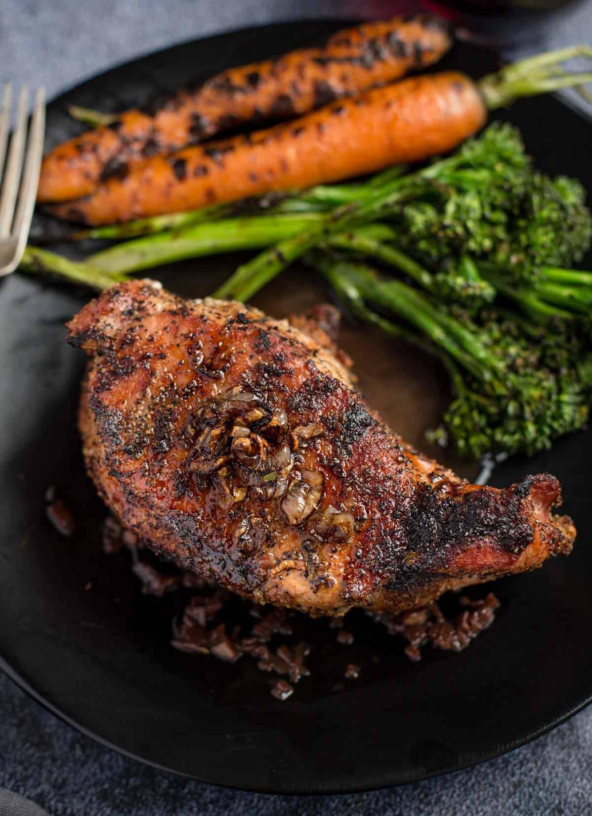  Perfectly seared pork chops drizzled with a tantalizing wine reduction
