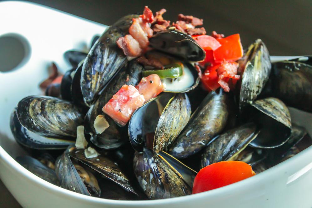  Plump, juicy mussels swimming in a bed of white wine is what dreams are made of.