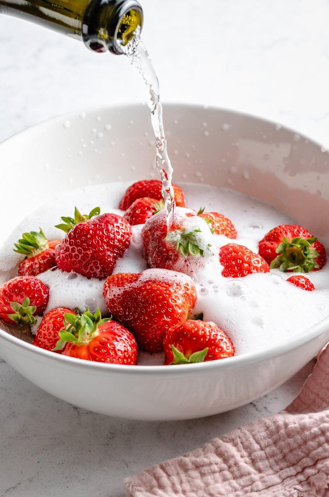  Pour on the Pink: fresh strawberries take a dip in our favorite wine
